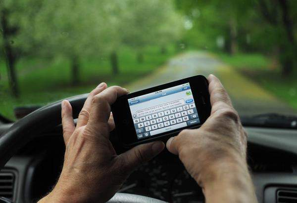 Texting & Driving Dangers: Brain Science & Solutions